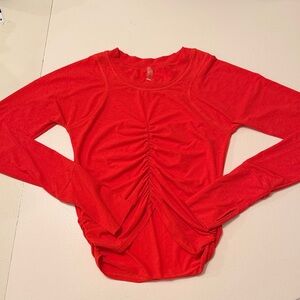 Free people movement orange tempo ruched Long Sleeve running top
